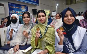 Chairman Education Board Abbash Ahmad Gondal and Vice Chancellor University of Sargodha Prof. Dr. Tasawar Hayyat awarding a gold medal and certificate to a position holder student during prize distribution ceremony of Higher Secondary School Certificate (HSSC) Annual Examination-2026 at Education Board Multipurpose Hall