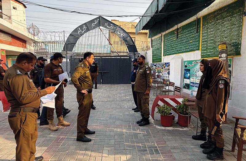 DPO Bahawalpur Police Rana Abdul Wahab reviews security arrangements for voters at a polling station in NA-168 during the by-election
