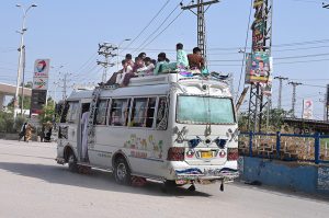 A large number of passengers travel on the rooftop of a coach at Fateh Chowk, highlighting a serious safety concern that requires the attention of the concerned authorities