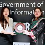 Ms. Wang Gaofei, Deputy Director, International Communication Department, China News Service (CNS) being presented shield by Acting Managing Director Associated Press of Pakistan, Sabeen Usman Khattak, at the APP Headquarters