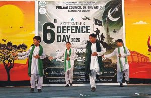 - School students perform in tableau during the Pakistan Defense Day event organized by the Punjab Council of the Arts.