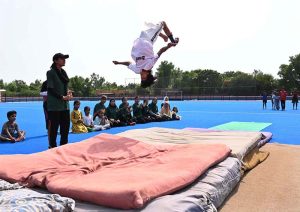 Gymnasts from the Sargodha Gymnastics Club demonstrate their skills during a ceremony honoring hockey players Maha Ramzan and Zaleera Sadaf, represented Pakistan’s Under-21 national team in China and Oman, at the Astroturf Hockey Stadium. The event was organized by the Sports Department and Fatima Women Hockey Club.