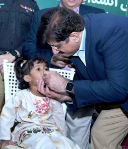 Sindh Chief Minister Syed Murad Ali Shah administers polio drops to a child while inaugurating the week-long anti-polio campaign at the Rotary Club Community Centre in Gulistan-i-Jauhar.