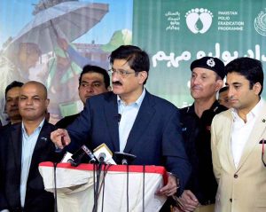 Sindh Chief Minister Syed Murad Ali Shah administers polio drops to a child while inaugurating the week-long anti-polio campaign at the Rotary Club Community Centre in Gulistan-i-Jauhar.
