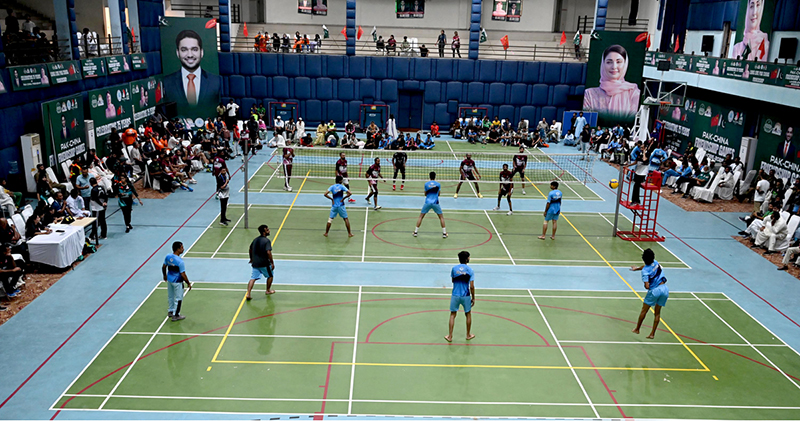 Players in action during volleyball match between Faisalabad and D.G Khan Volley ball teams during Pak-China Friendship Games to celebrate 75 years of diplomatic ties between Pakistan and China at multiple venues of the Nishtar Park Sports Complex