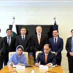 Marryum Pervaiz, Secretary to the Commission CCP, and Muhammad Tahir, Director General (SID) NAB, signing the addedum to the foundational MoU between CCP and NAB in the presence of Chairman NAB Lt Gen (R) Nazir Ahmed, CCP Chairman Farid Ahmed Tarar, and senior officers
