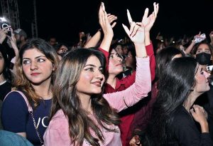 Women and girls participate in the Lahooti Melo organized by the Sindh Government to mark World Peace Day at the Police Training School Ground.