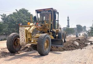Heavy machinery and construction crews are working on the rehabilitation, expansion, and dualization of the eastern service road along the Islamabad Expressway as part of a Capital Development Authority (CDA) project to upgrade the 9-kilometre stretch from Faizabad Interchange to Gulberg Greens into a six-lane carriageway.