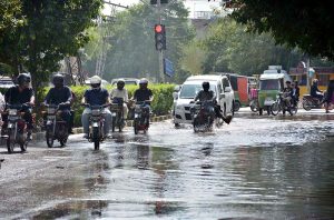 A view of vehicles passing through sewerage water accumulated at-D-Ground Chowk needs the attention of concerned authorities
