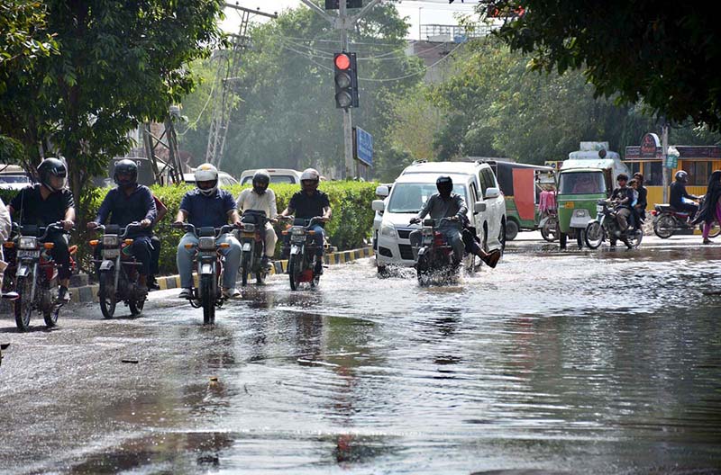 A view of vehicles passing through sewerage water accumulated at-D-Ground Chowk needs the attention of concerned authorities