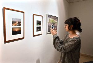Parliamentary Secretary for Federal Education and Professional Training Ms. Farah Naz Akbar views photographs on display at the “Frames of Freedom” exhibition, celebrating Pakistan’s beauty, heritage, cultural diversity and national spirit, following its inauguration at the COMSATS Art Gallery.