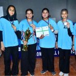 A group photo of Net ball team of Shah Latif Girls collage with wining trophy during closing ceremony of 5th PNF net ball cup 2026 at Hyderabad club