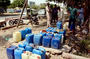 People fill water containers after breaking a government water-supply pipeline in Korangi, highlighting the persistent challenges faced by residents in accessing a reliable supply of potable water. The incident reflects growing public frustration over water shortages and the need for effective measures to ensure uninterrupted water distribution in densely populated areas of the city