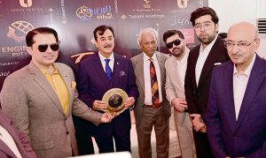Renowned businessman Hamza Tabani presents a commemorative shield to Chairman Senate Syed Yousaf Raza Gilani during a luncheon hosted by Hamza Tabani in honour of Chairman Senate Syed Yousaf Raza Gilani and Sindh Governor Nehal Hashmi
