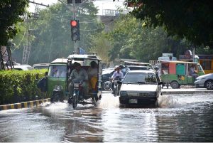 A view of vehicles passing through sewerage water accumulated at-D-Ground Chowk needs the attention of concerned authorities