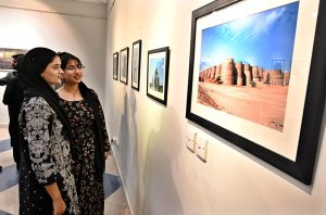 Parliamentary Secretary for Federal Education and Professional Training Ms. Farah Naz Akbar views photographs on display at the “Frames of Freedom” exhibition, celebrating Pakistan’s beauty, heritage, cultural diversity and national spirit, following its inauguration at the COMSATS Art Gallery.