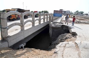 A damaged bridge on the Rice Canal in Nazar Colony poses a risk of accidents and requires the attention of the concerned authorities