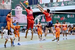 Players in action during volleyball match between Gujranwala and Lahore Volley ball teams during Pak-China Friendship Games to celebrate 75 years of diplomatic ties between Pakistan and China at multiple venues of the Nishtar Park Sports Complex