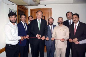 Federal Minister for Planning, Development and Special Initiatives Professor Ahsan Iqbal cuts the ribbon to inaugurate the Business Excellence Award Center following the “Business Excellence Award Ceremony for SMEs & Top Exporters of Faisalabad” at the Faisalabad Chamber of Commerce & Industry (FCCI), marking the completion of FCCI’s 50 years of excellence.