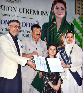 Chairman BISE Faisalabad Dr. Rana Binyamin presents certificates and medals to position-holder students at a ceremony announcing the Intermediate Examination 2026 results.
