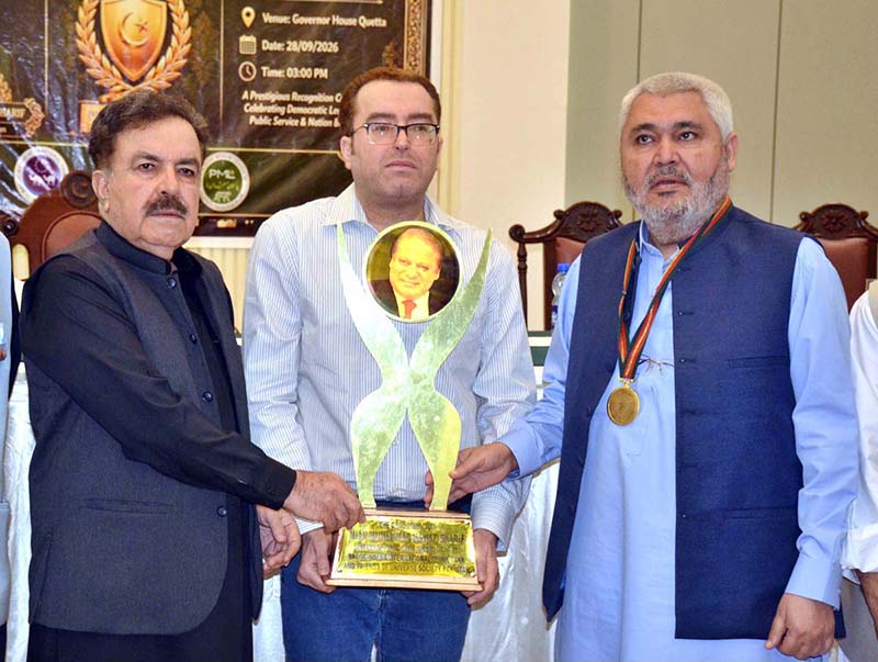 Balochistan Governor Sheikh Jaffar Khan Mandokhail presents the Real Democrat Mian Mohammad Nawaz Sharif International Civil Award 2026–27 to former Speaker of the Balochistan Assembly, Jamal Shah, at the Governor House
