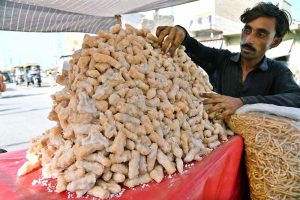 A vendor selling traditional sweet items at Bandar Road