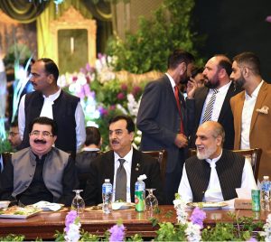Acting President Syed Yousuf Raza Gilani with former Chairman Senate Muhammad Sadiq Sanjrani and Federal Minister for Science and Technology Khalid Hussain Magsi at a wedding reception