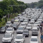 A view of a massive traffic jam at Chak Shahzad Road in the Federal Capital