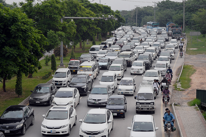 A view of a massive traffic jam at Chak Shahzad Road in the Federal Capital