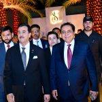 Acting President Syed Yousuf Raza Gilani with former Senator and former Federal Minister Waqar Ahmed Khan at the walima reception of his son