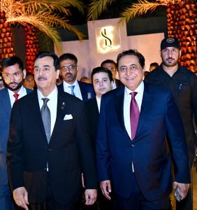 Acting President Syed Yousuf Raza Gilani with former Senator and former Federal Minister Waqar Ahmed Khan at the walima reception of his son