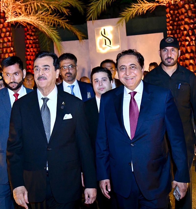 Acting President Syed Yousuf Raza Gilani with former Senator and former Federal Minister Waqar Ahmed Khan at the walima reception of his son