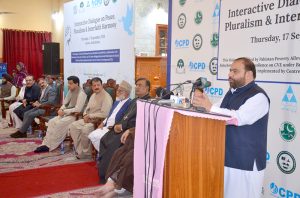 Federal Minister for National Heritage and Culture Aurangzeb Khan Khichi addresses a ceremony marking an interactive dialogue on peace, pluralism and interfaith harmony, organized at the Methodist Church in provincial capital.
