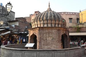 A view of the historic Dina Nath Well inside Delhi Gate in the Walled City. The well, commissioned by Raja Dina Nath in the mid-19th century during the reign of Maharaja Ranjit Singh, is enclosed within a walled structure near Wazir Khan Chowk.