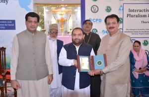 Federal Minister for National Heritage and Culture Aurangzeb Khan Khichi addresses a ceremony marking an interactive dialogue on peace, pluralism and interfaith harmony, organized at the Methodist Church in provincial capital.