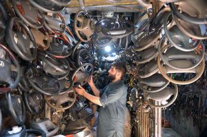 Vendor display a wide range of second-hand auto spare parts at Shoba Bazaar, bustling market, known for its affordable vehicle parts, draws customers looking for budget-friendly alternatives to new spare parts