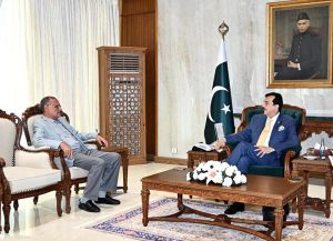Acting President Syed Yousuf Raza Gilani in a meeting with former federal minister and Senator Azam Khan Swati at Aiwan-e-Sadr in federal capital.