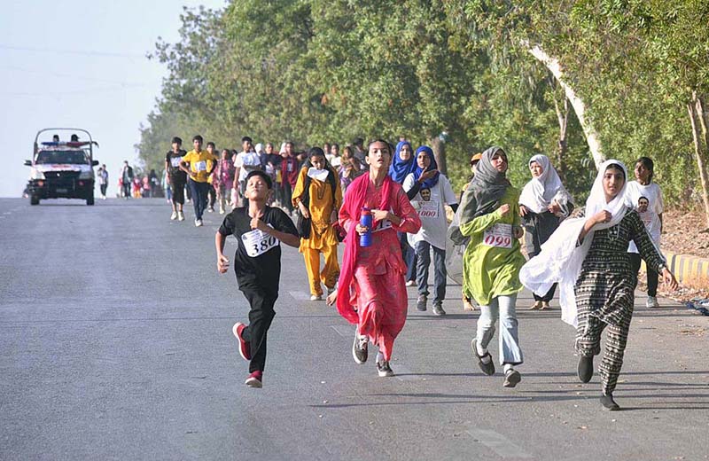 Participants run during a World Peace Day Marathon organized at Mazar-e-Quaid, Karachi, under the auspices of Pakistan Peace Ambassador Aurangzeb Sultan and Shamim Mumtaz Sports Academy, in collaboration with Deputy Commissioner Karachi East Nasrullah Abbasi and Assistant Commissioner Karachi East Mohammad Nawaz Ghamro