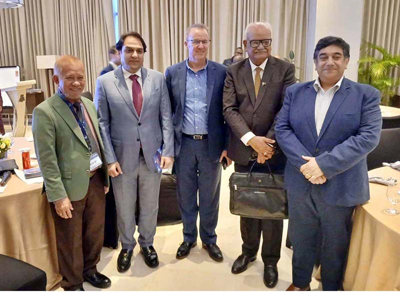 Senator Abdul Qadir and Senator Syed Waqar Mehdi in a group photograph with delegates from different countries during the first gathering of intergovernmental fiscal institutions