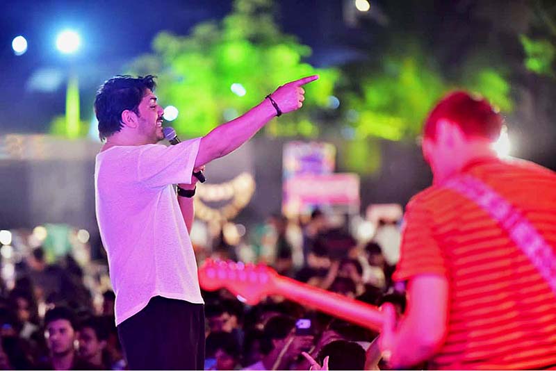 Goher Mumtaz of the JAL Band performs during a concert at the Pakistan National Council of the Arts (PNCA)