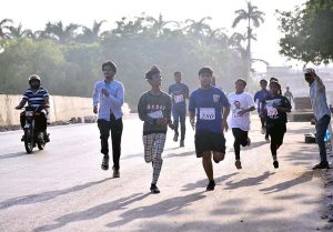 Participants run during a World Peace Day Marathon organized at Mazar-e-Quaid, Karachi, under the auspices of Pakistan Peace Ambassador Aurangzeb Sultan and Shamim Mumtaz Sports Academy, in collaboration with Deputy Commissioner Karachi East Nasrullah Abbasi and Assistant Commissioner Karachi East Mohammad Nawaz Ghamro