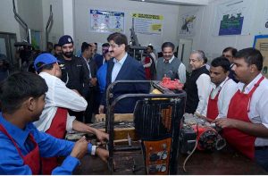 Sindh Chief Minister Syed Murad Ali Shah visits a workshop at the Government Special Education and Rehabilitation Complex in Gulistan-e-Jauhar and asks students about their experiences of the professional training being imparted to them.