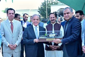 Federal Minister for Interior Moshin Naqvi presents a model of EV of "Capital Patrol", an initiative of Islamabad Capital Territory Police to Prime Minister Muhammad Shehbaz Sharif.