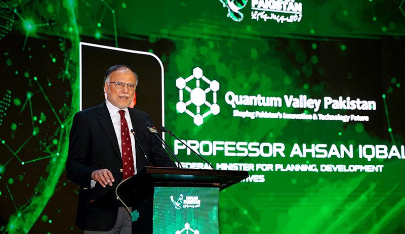 Federal Minister for Planning, Development and Special Initiatives Ahsan Iqbal addressing the Launch Ceremony of Quantum Valley Pakistan, titled "Shaping Pakistan's Innovation & Technology Future," at the Pak-China Friendship Centre