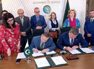 EU Ambassador to Pakistan, H.E. Raimundas Karoblis, and Secretary Economic Affairs Division, Mr. Muhammad Humair Karim, sign agreements between Pakistan and the European Union.