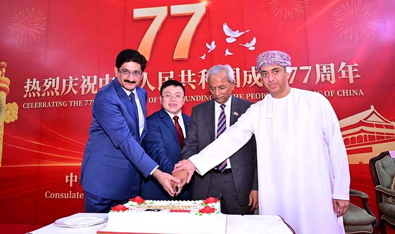 Sindh Chief Minister Syed Murad Ali Shah, Sindh Governor Nehal Hashmi , acting Chinese Consul General Feng Deheng,and Omani Consul General Sami Abdullah Salim Al Khanjari cut a cake to mark the 77th anniversary of the founding of the People’s Republic of China at the Chinese Consulate