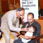 Federal Minister for Planning, Development and Special Initiatives Ahsan Iqbal administers polio drops to a child during the meeting of the Prime Minister’s Committee on the National Taskforce for Polio Eradication, chaired by him
