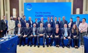 Federal Minister for Planning, Development and Special Initiatives Ahsan Iqbal in a group photograph with participants of the Governing Council Meeting of the CAREC Institute