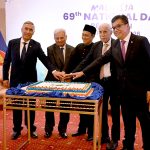 Federal Minister for Board of Investment Qaiser Ahmed Shaikh and Federal Minister for National Food Security and Research Rana Tanveer Hussain, along with Malaysian High Commissioner Dato’ Mohammad Azhar Mazlan, cut a cake to celebrate Malaysia’s 69th National Day at a local hotel