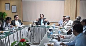 Federal Minister for Railways Muhammad Hanif Abbasi chairs a meeting with staff during his visit to Pakistan Locomotive Factory.